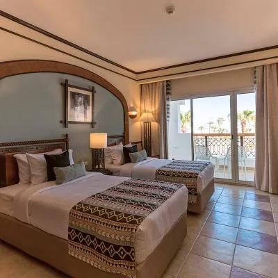 A Bedroom With Two Beds