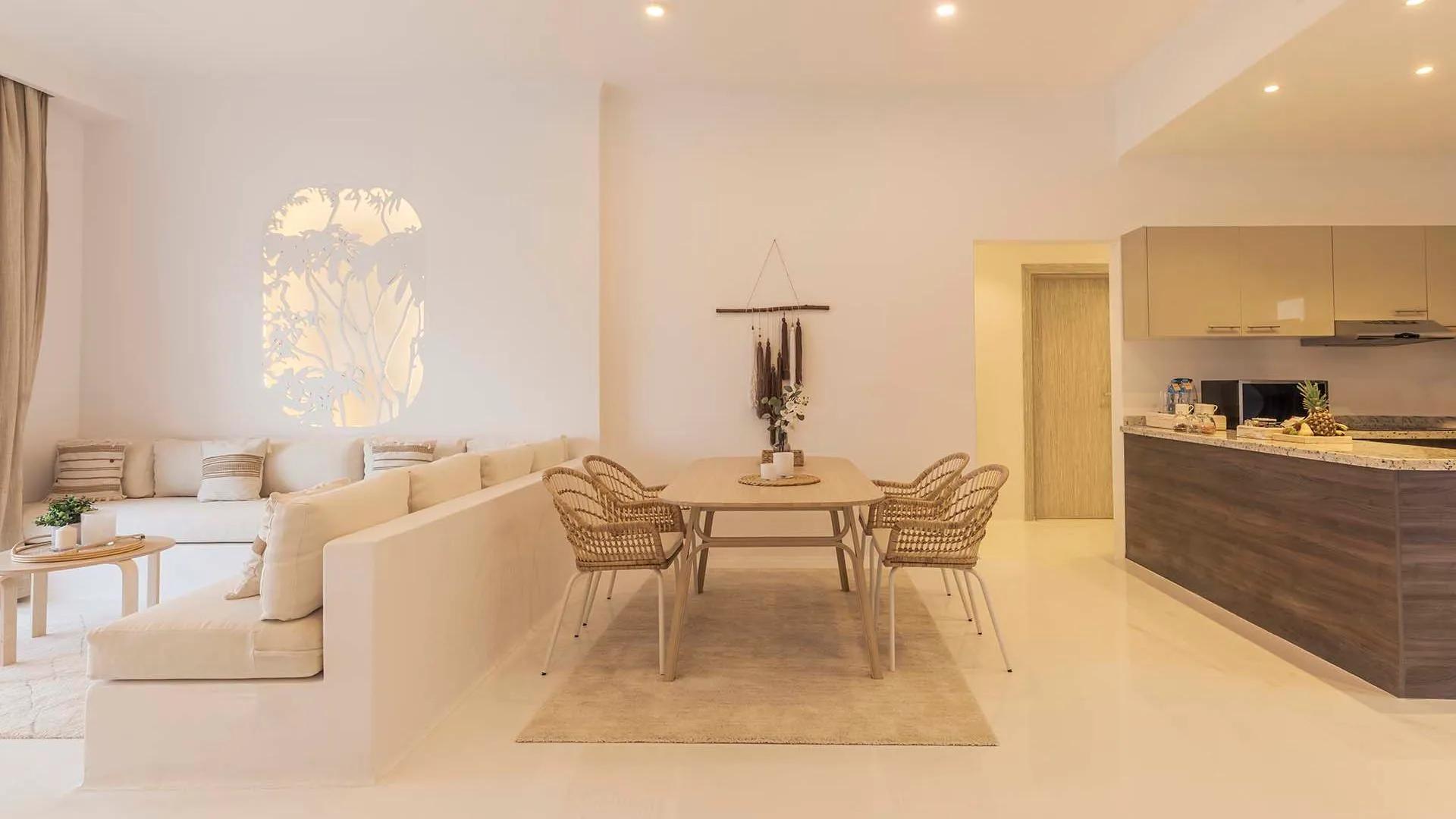 A Living Room With A Couch And A Table