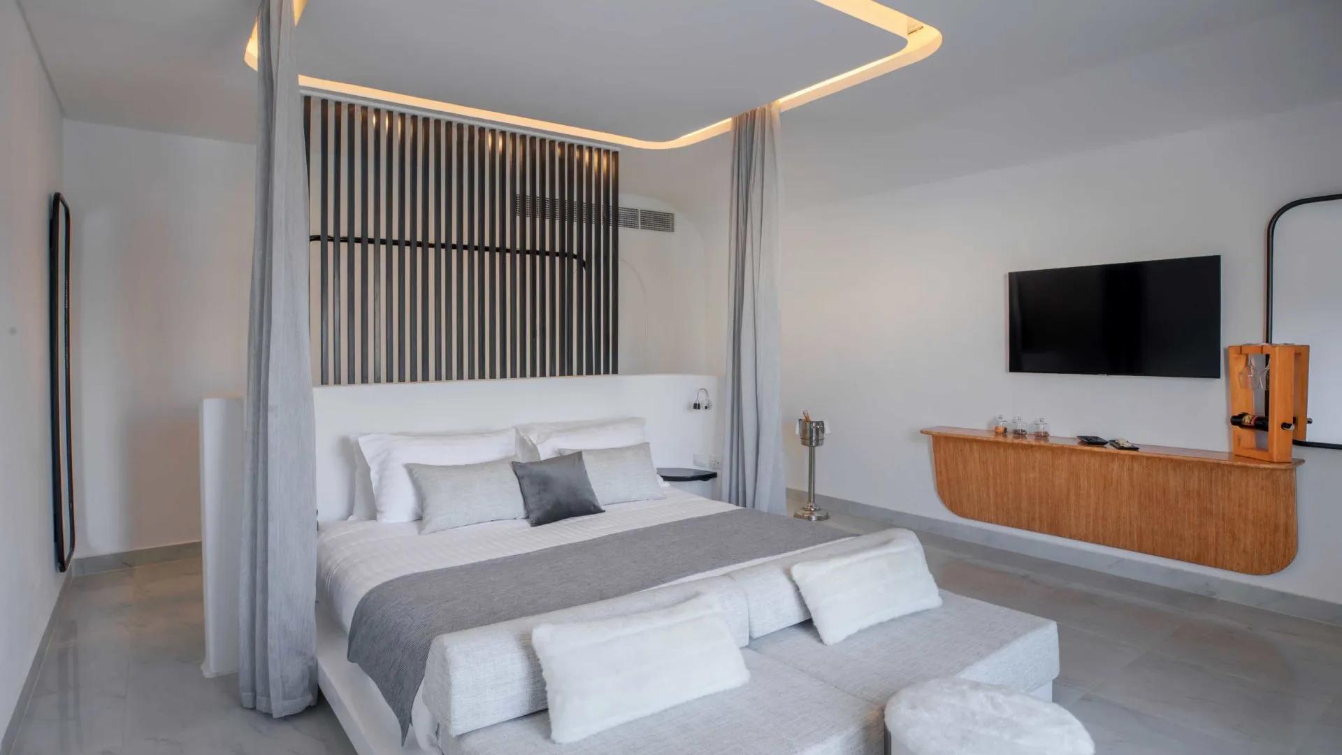 A Bed With White Pillows