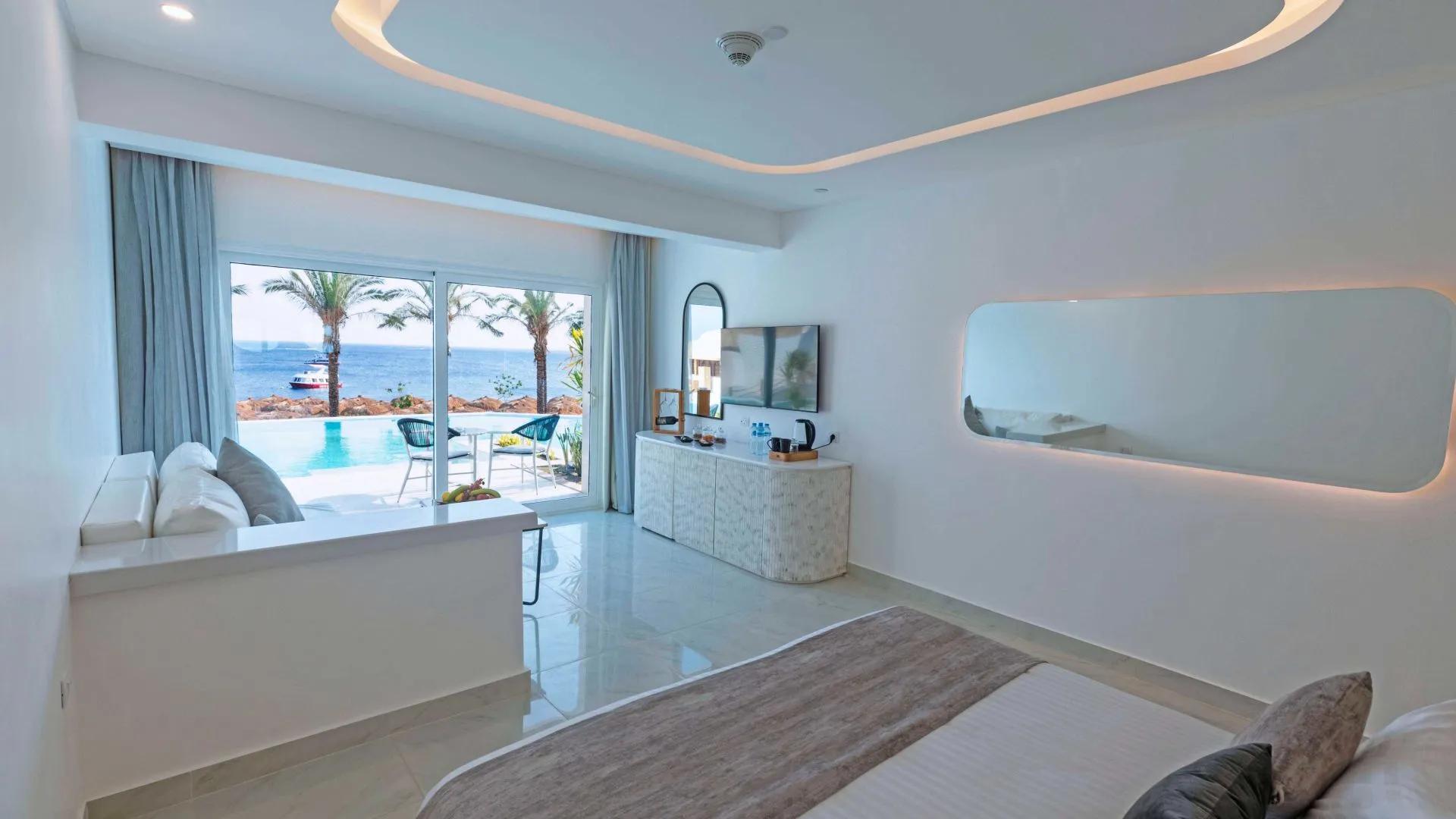 A Large Bathroom With A Large Tub