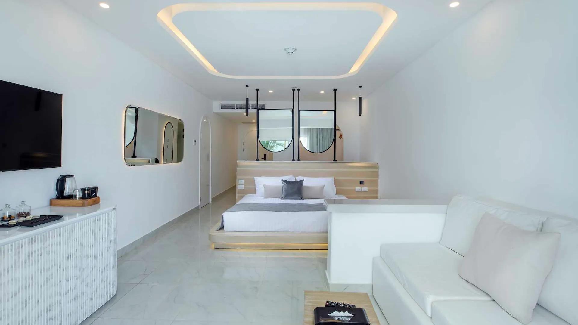 A Living Room With White Furniture