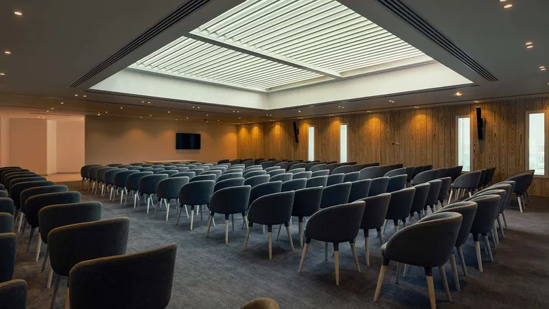 A Room With Rows Of Chairs