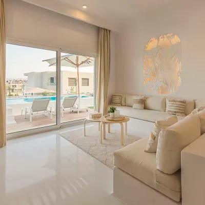 A Living Room With A Large Window
