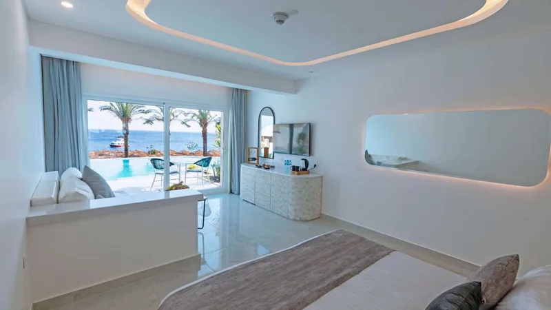 A Large Bathroom With A Large Tub